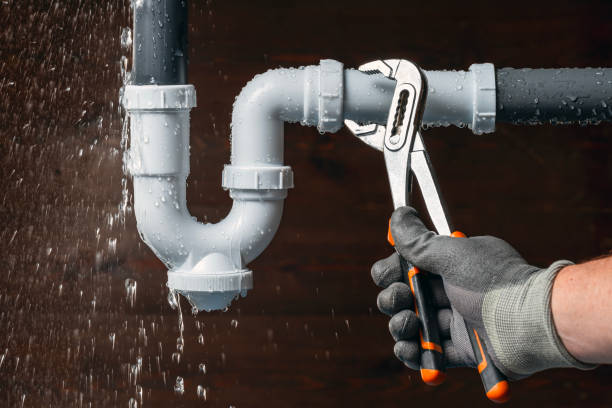 Professional Drain Cleaning technician working in Newton Center, MA